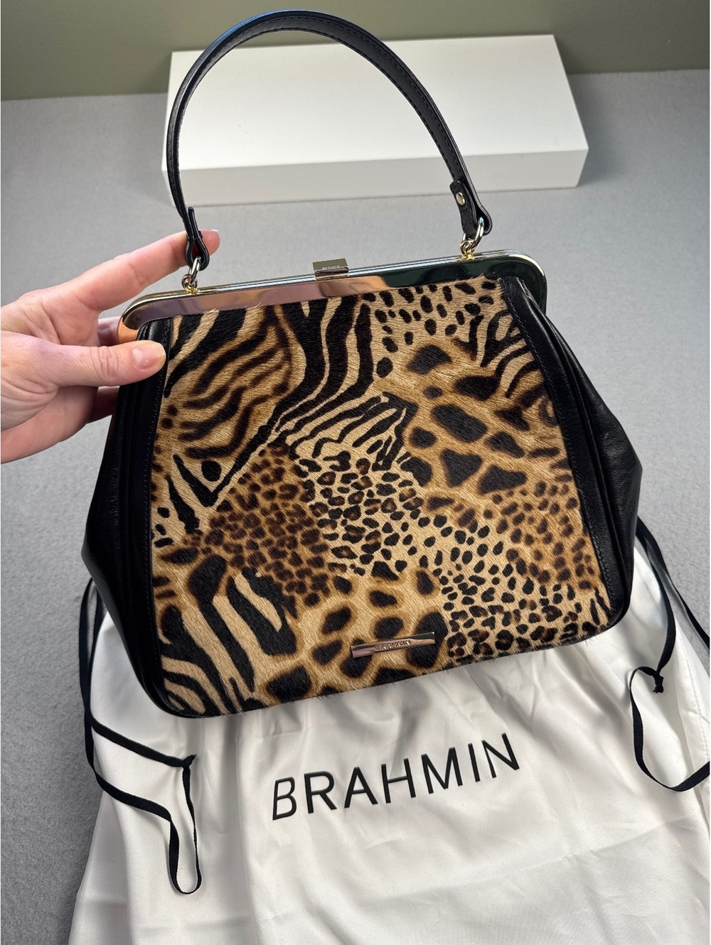 Brahmin Animal Print structured top handle and gold ton hardware